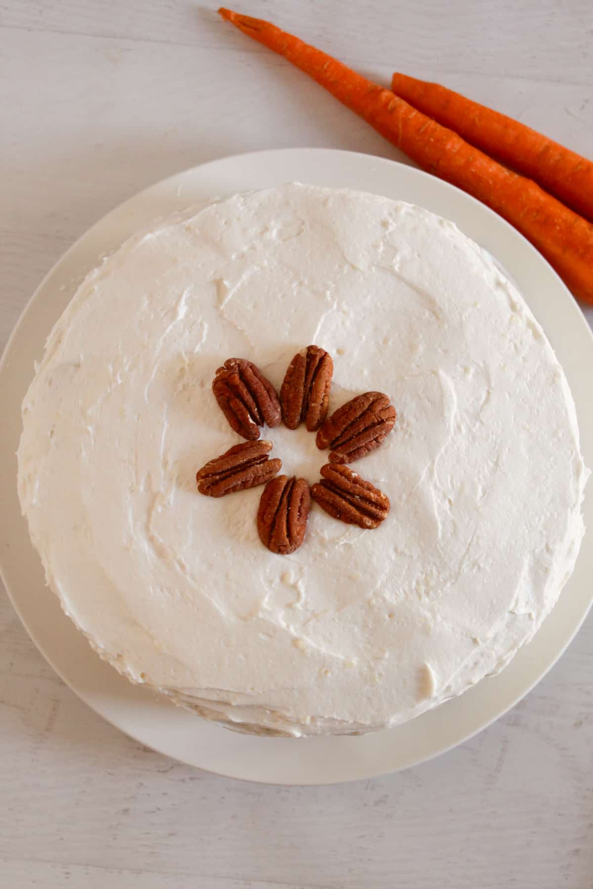 overhead shot of a whole gluten free carrot cake.