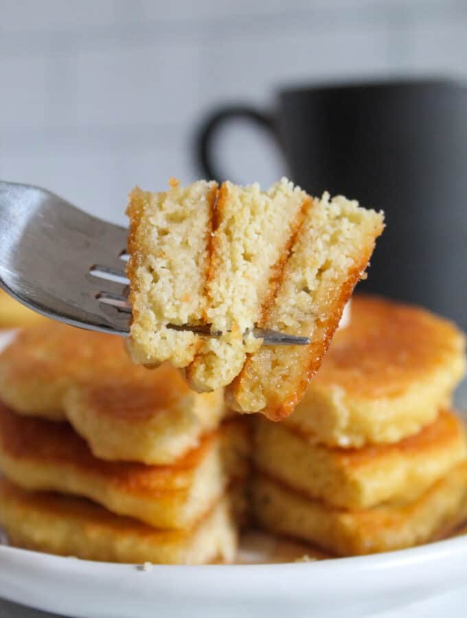 bite of almond flour pancakes on a fork.