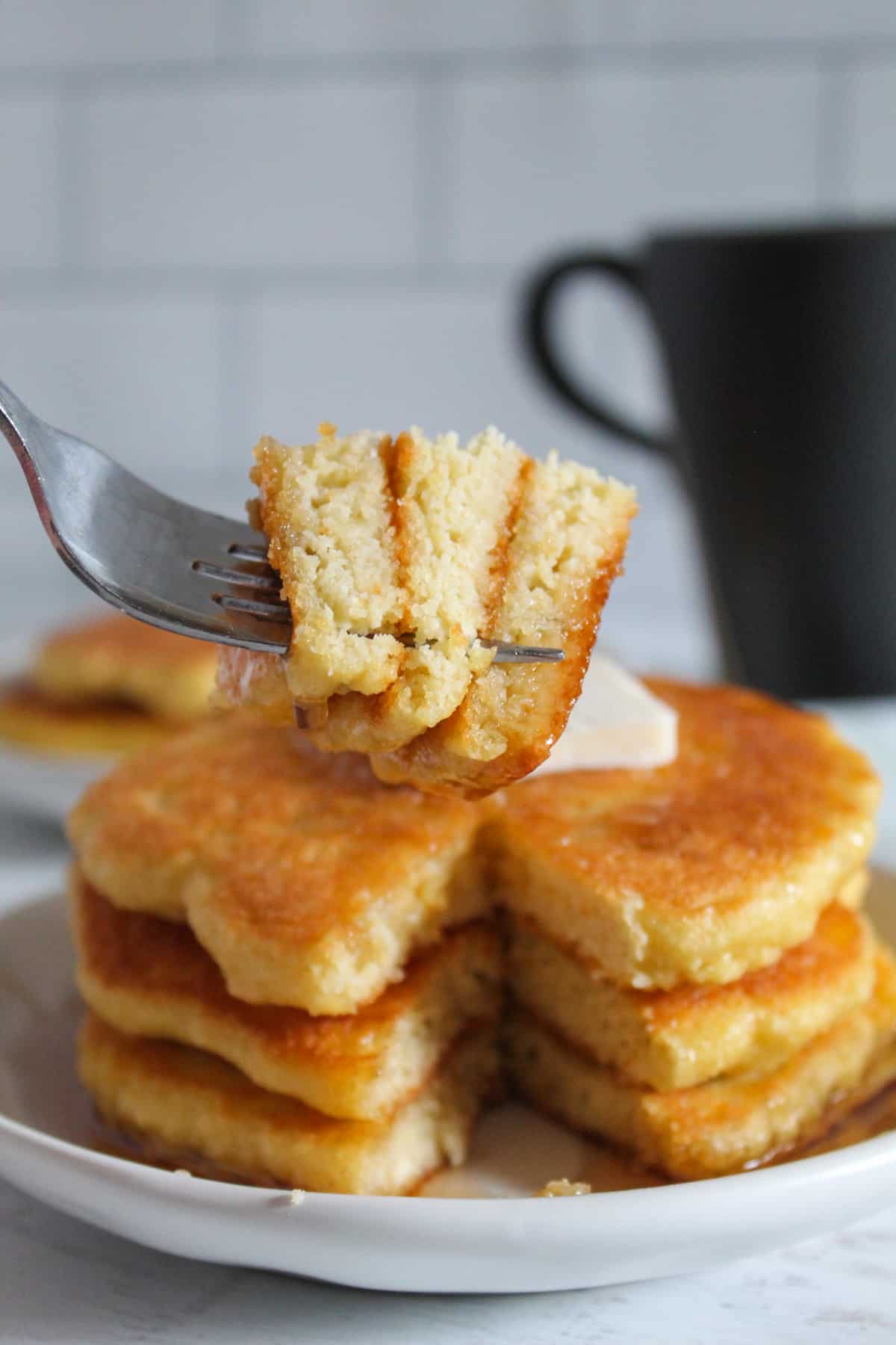 bite of pancakes on a fork.