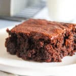 piece of almond flour brownie on a plate.