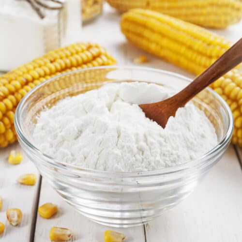 glass bowl of corn flour on a counter.