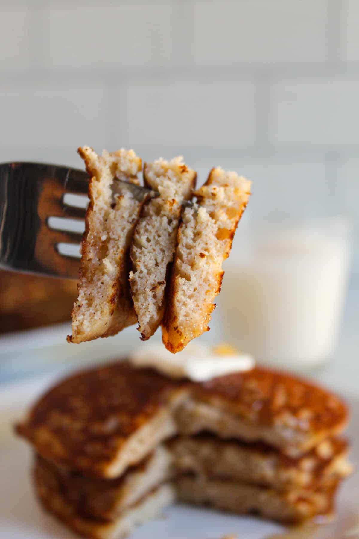 bite of rice flour pancakes on a fork