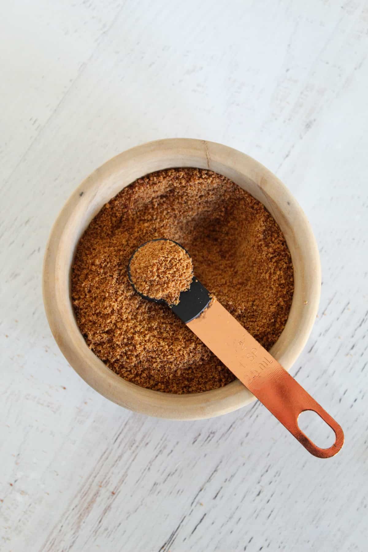 brown bowl of coconut sugar.