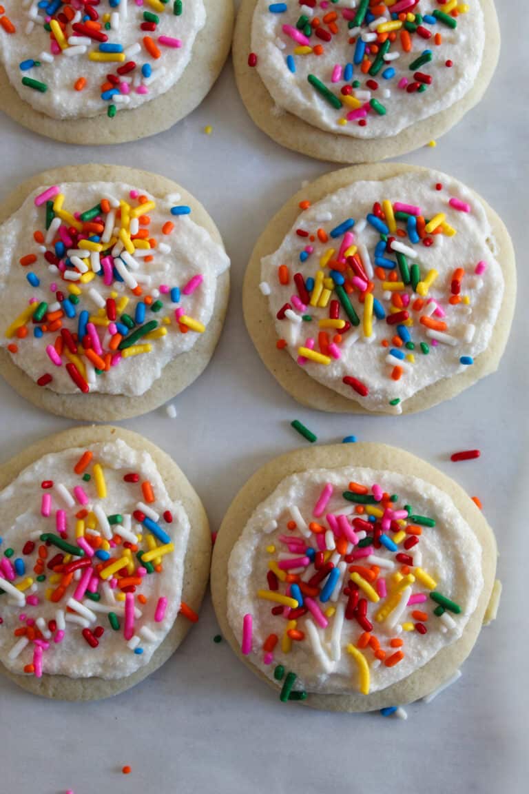two rows of decorated gluten free sugar cookies