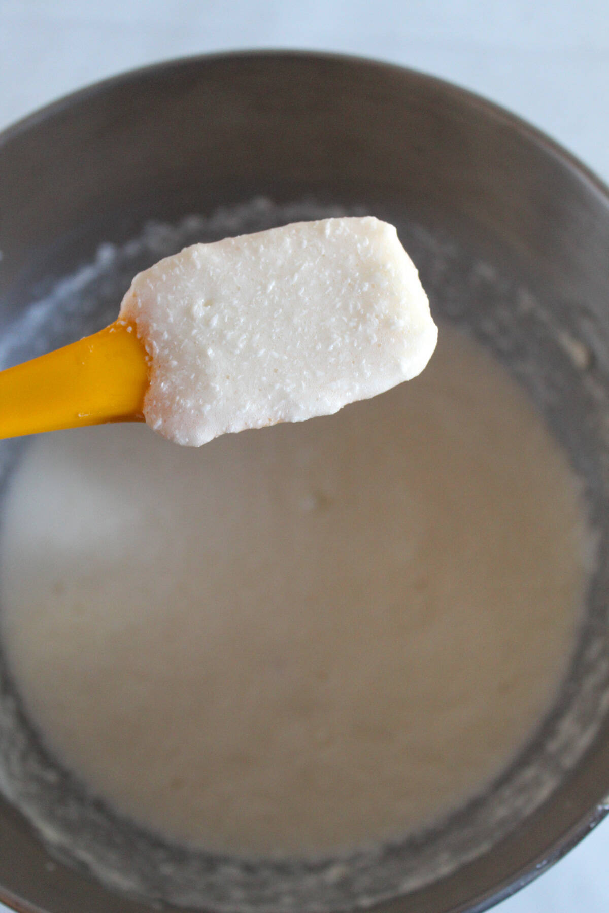 beat wet ingredients until smooth and creamy for baking gluten free cake.
