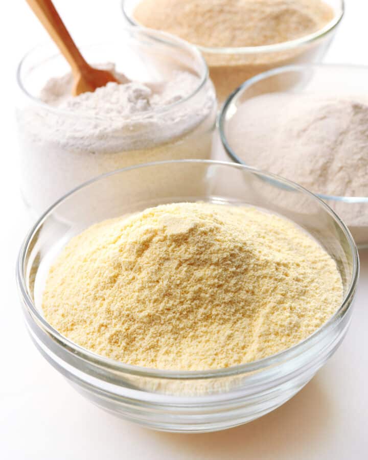 clear bowl of cornmeal on a counter