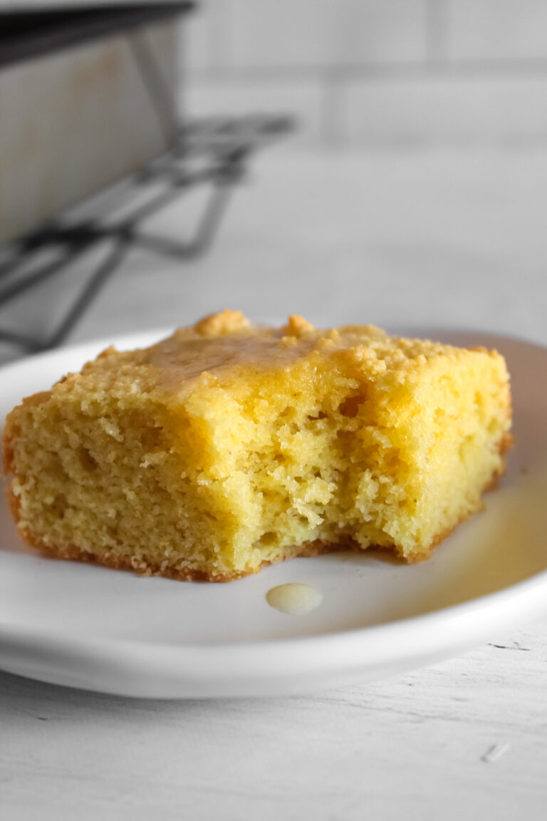 bite taken out of a slice of cornbread