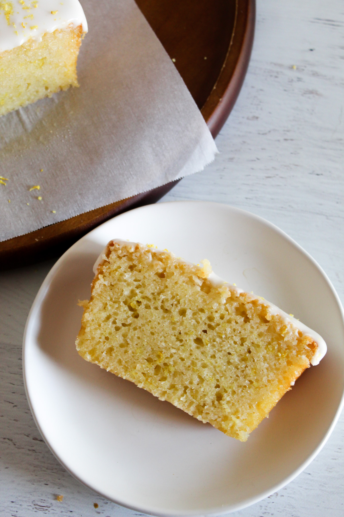 slice of lemon pound cake on a white plate