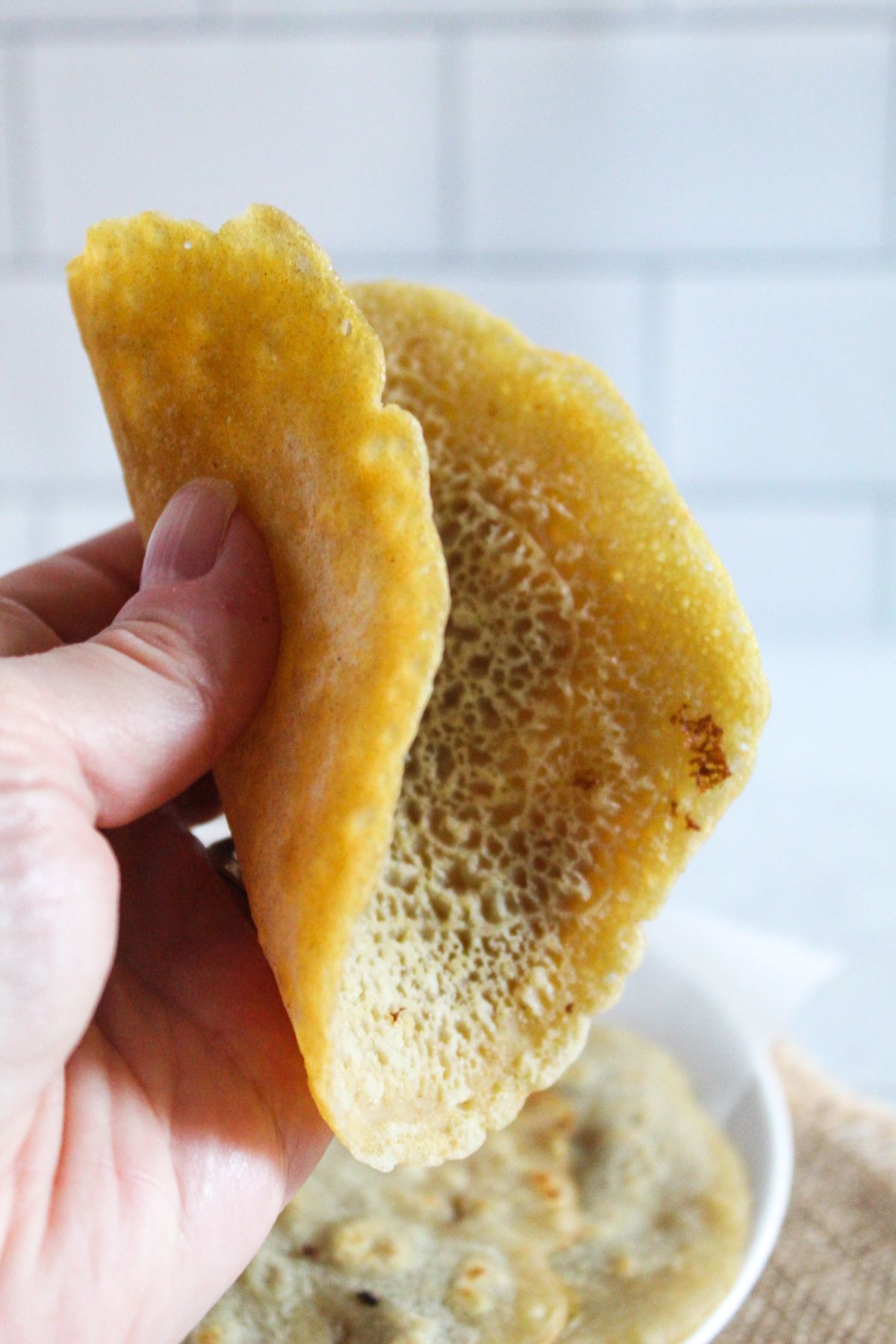 hand holding a crepe