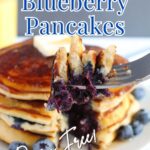 fork full of blueberry pancakes
