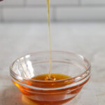 small glass bowl of agave syrup