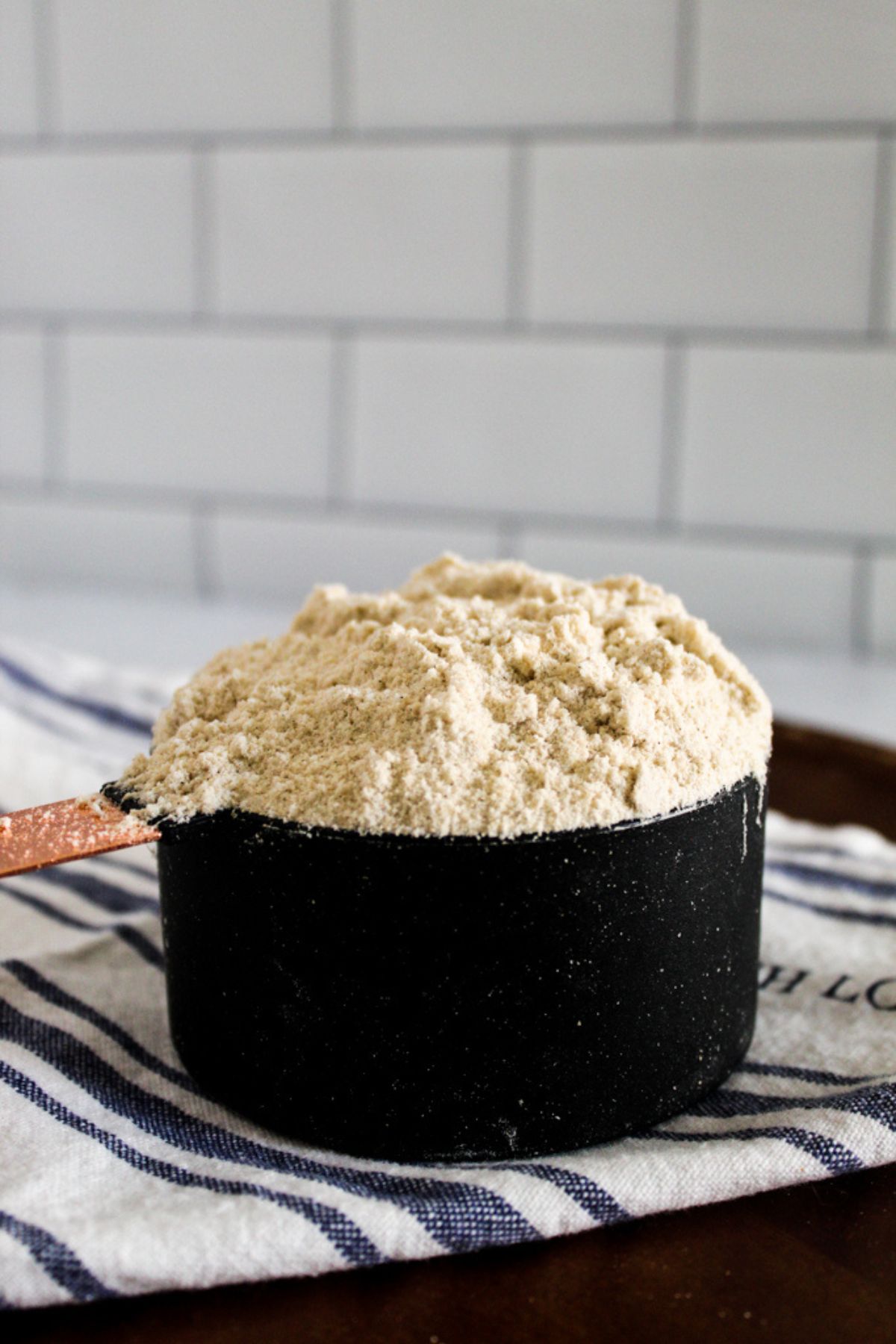 measuring cup of sorghum flour