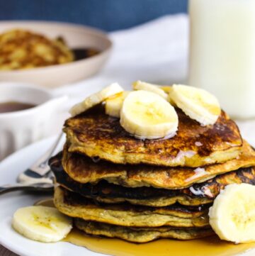 stack of pancakes on a white plate