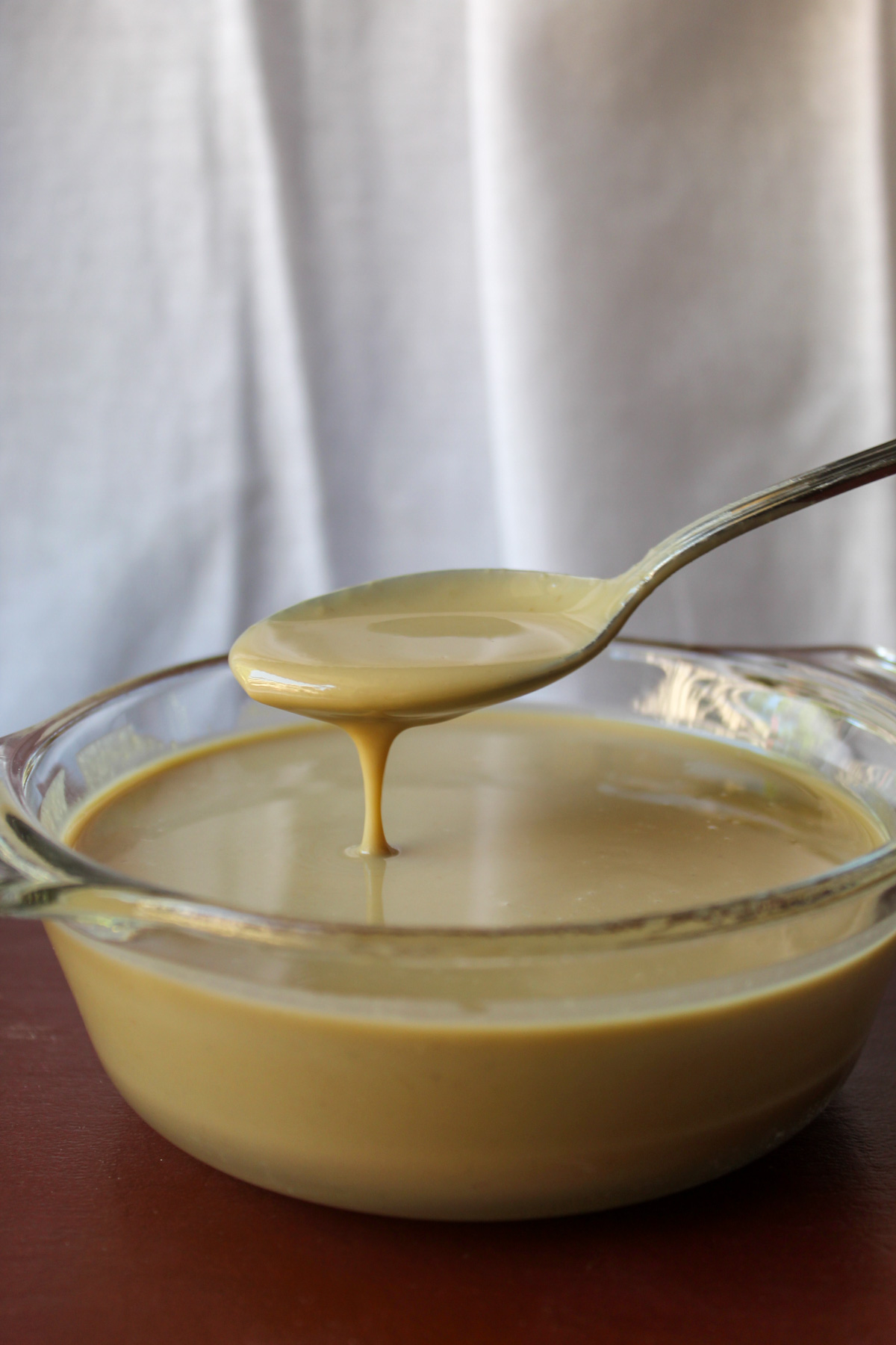 glass bowl of tahini