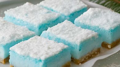 Gluten free coconut custard squares with blue food coloring