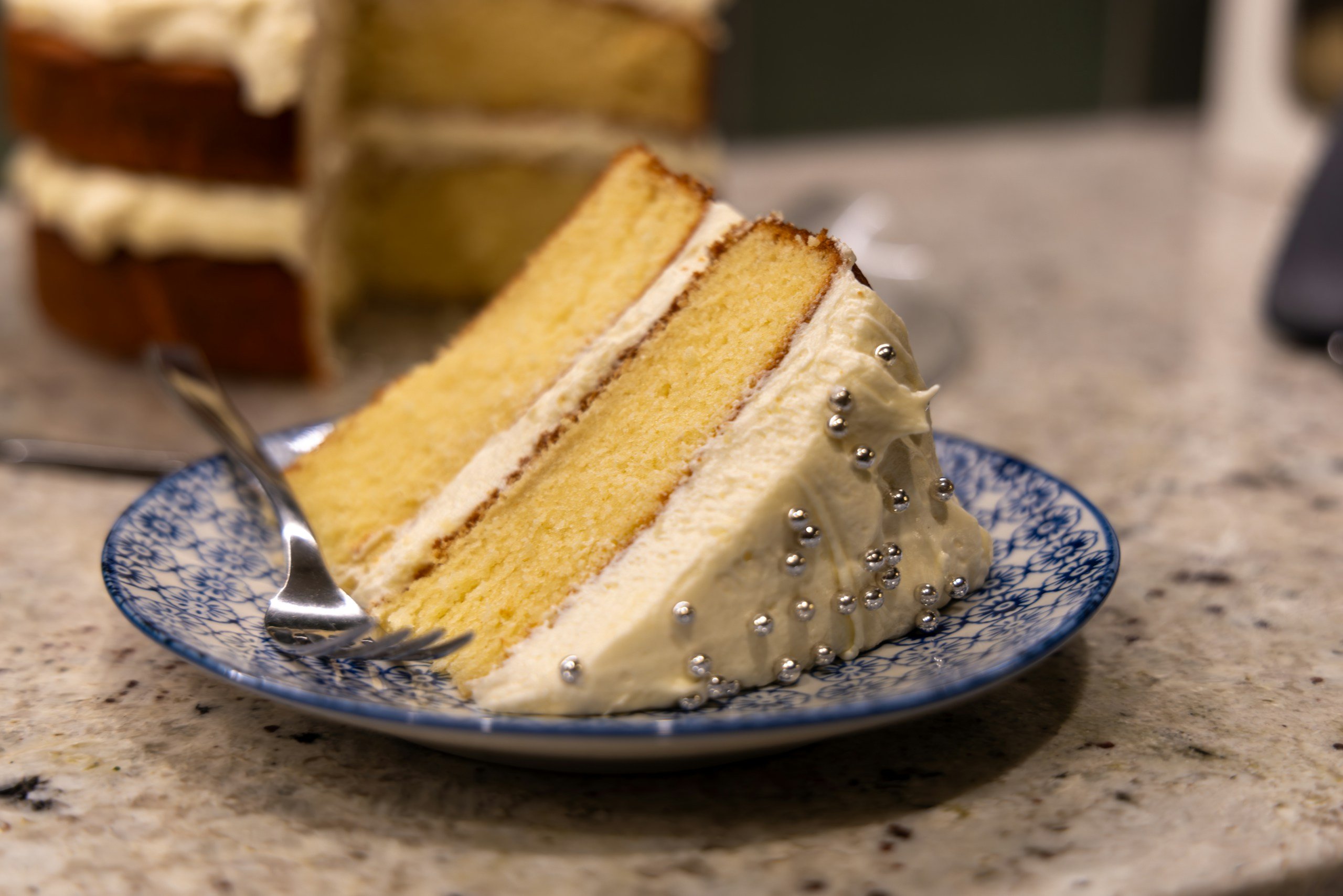 a slice of cake on a plate with a fork