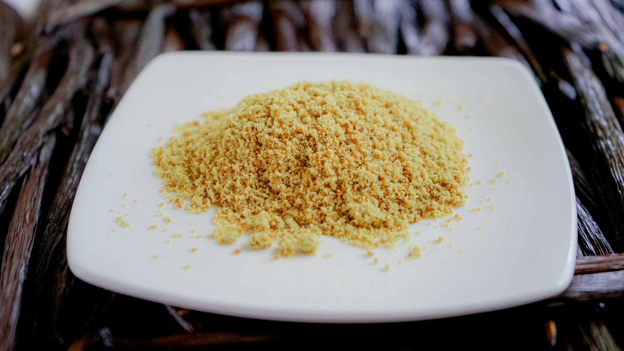 cooked quinoa on a white plate