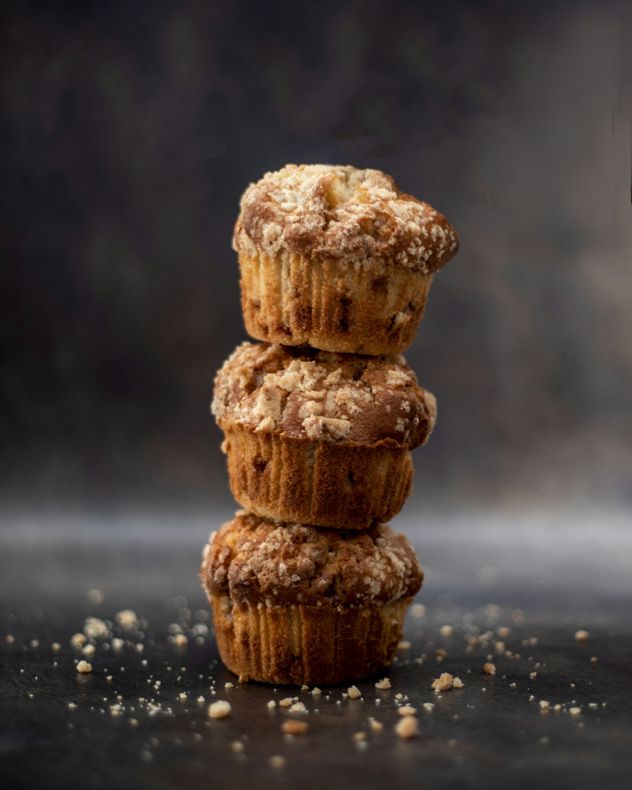 stack of three oat flour muffins